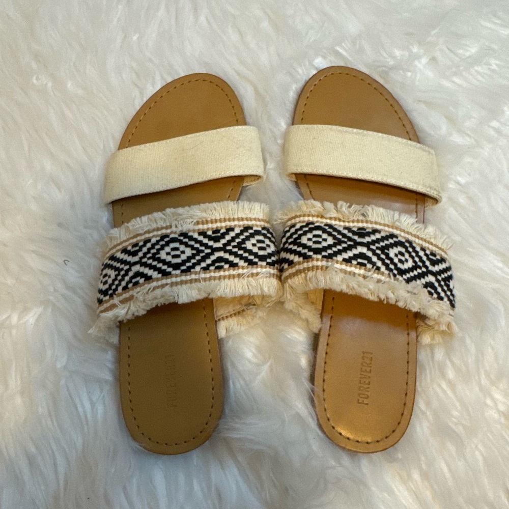 Forever 21 tan sandal size 6.5, cloth straps with fringe, aztec pattern